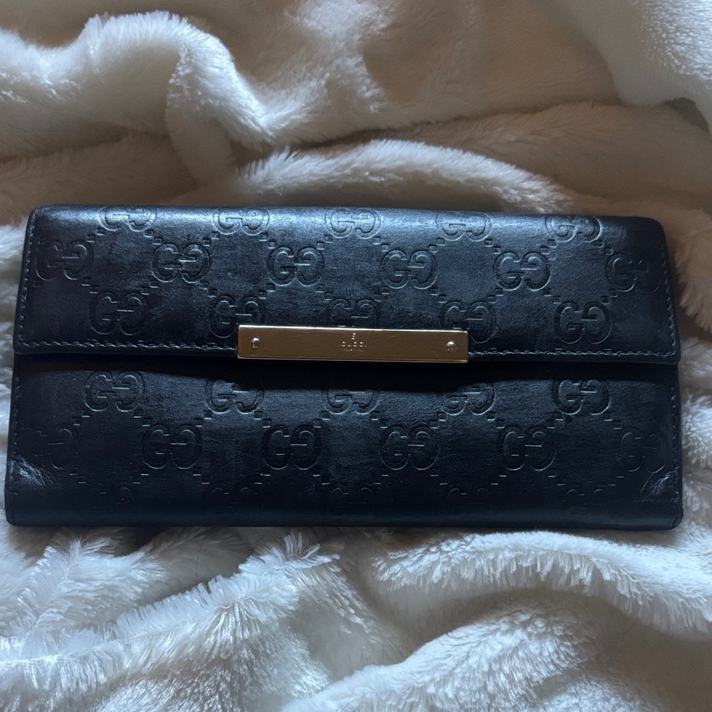 Gucci Black Embossed GG Leather Continental Wallet. Comes with COA